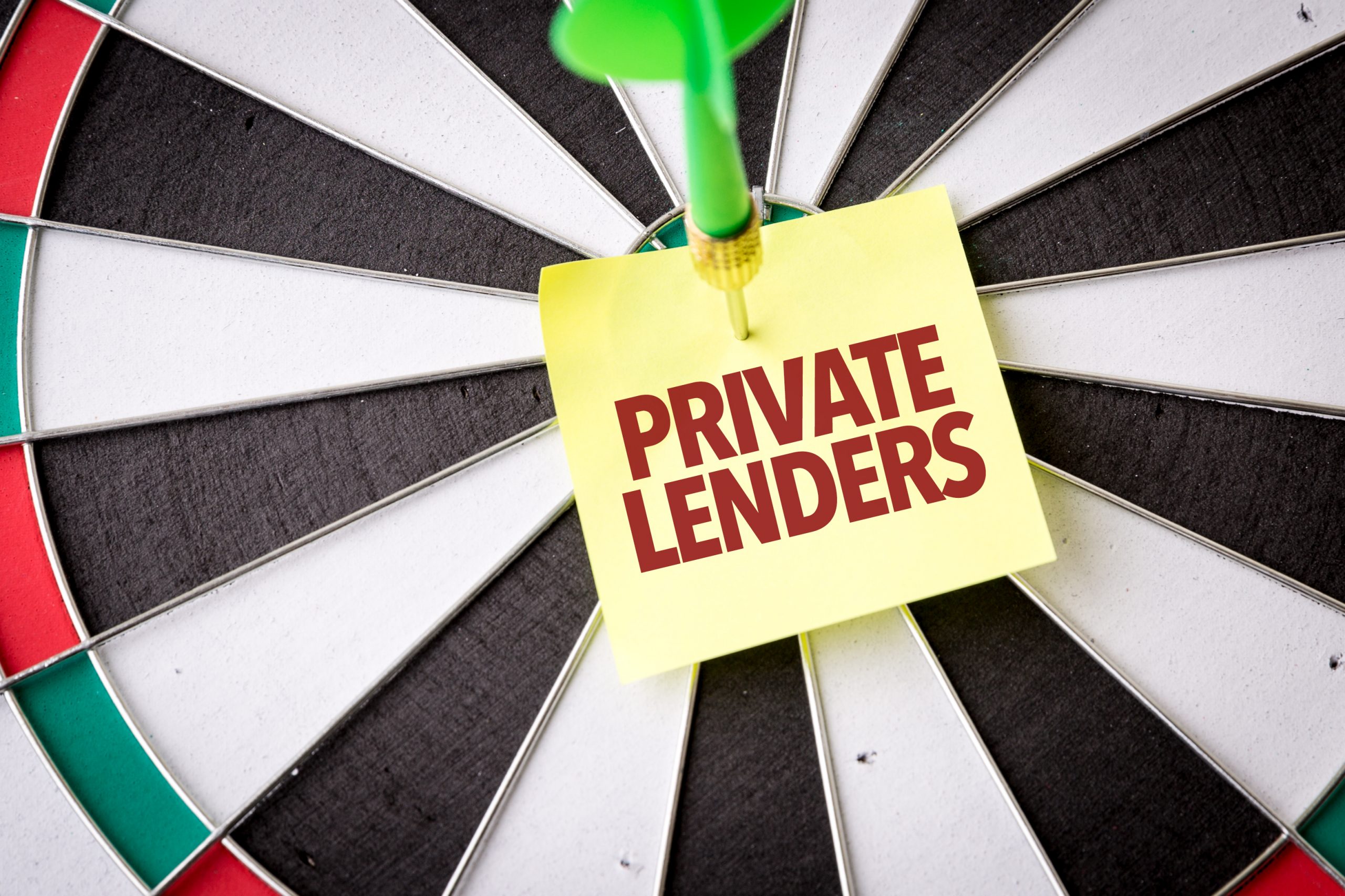 dartboard with a post-it note stuck to it with "private lenders" written on it